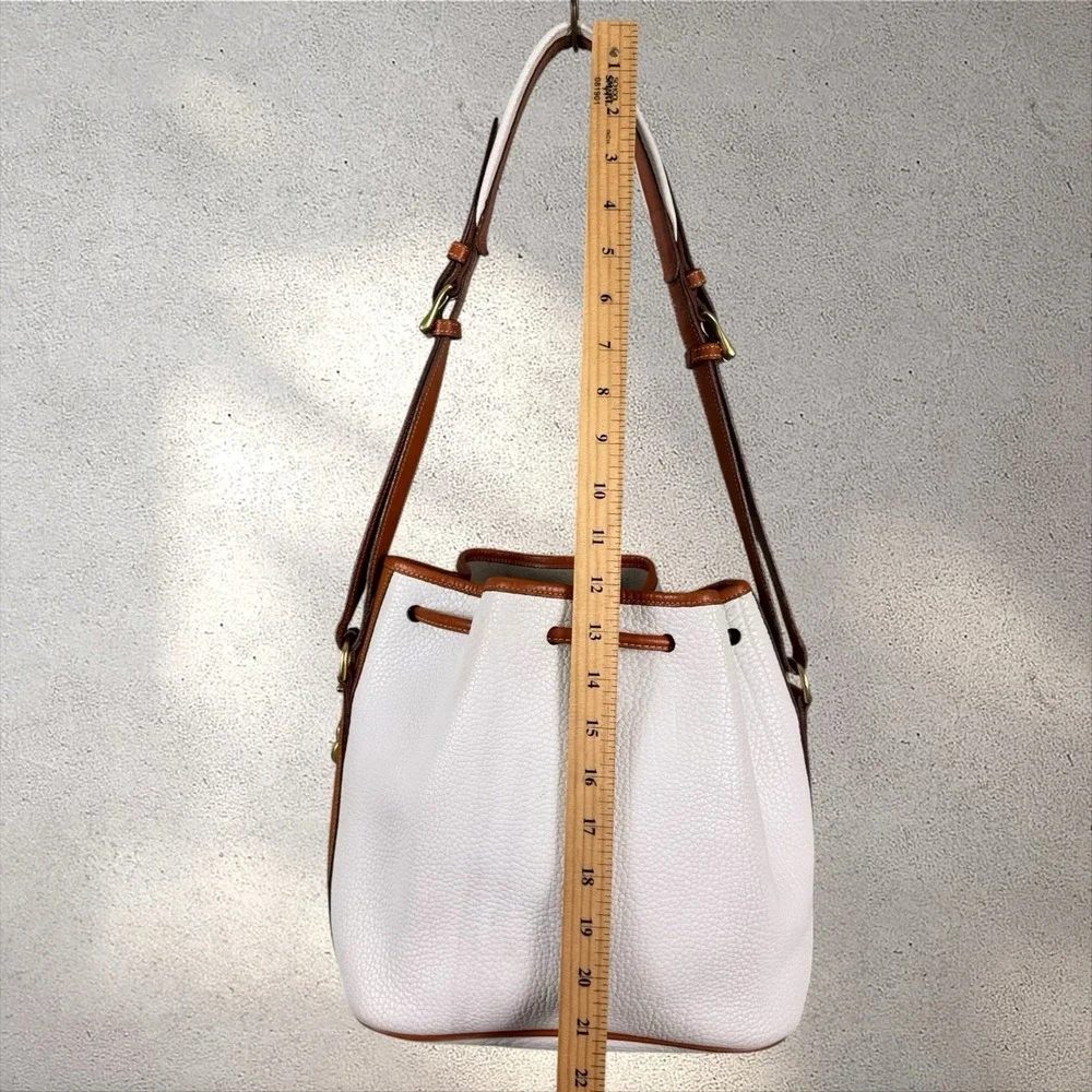 Dooney & Bourke Vintage White Tan Leather Drawstring Bucket Bag AWL Tassel USA